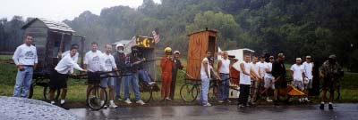 Lineup of Outhouses